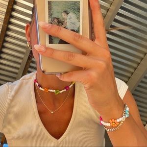 Matching beaded daisy bracelet and necklace